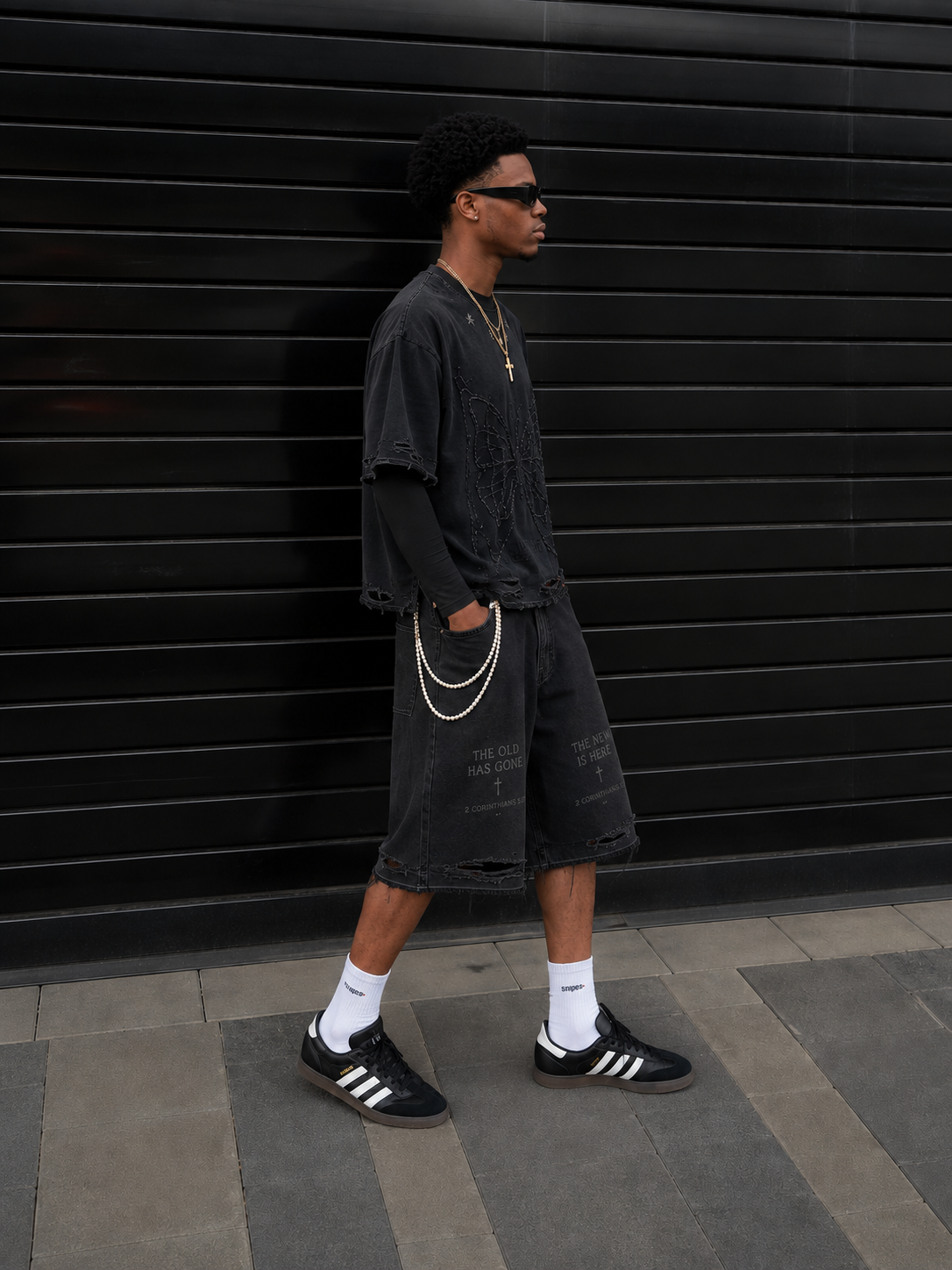 New Creation Shorts in washed black with 'The Old Has Gone / The New Is Here' print